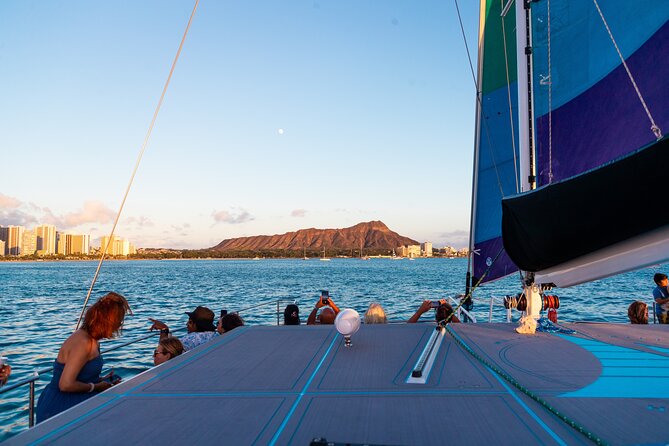 Board from Waikiki Beach for a scenic Sunset Sail on the Hāwea - Settling onto the 50-foot Hāwea