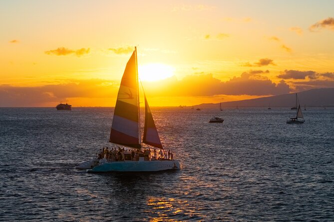 Board from Waikiki Beach for a scenic Sunset Sail on the Hāwea - Drinks, music, and the mood onboard