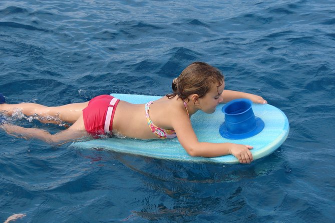Deluxe Snorkel & Dolphin Watch Aboard a Luxury Catamaran from Kailua-Kona - Lunch on the return portion