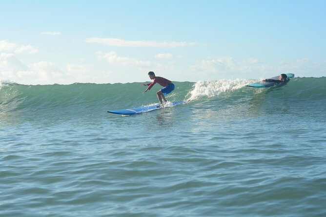 Group Surf Lesson at Kalama Beach in Kihei - Catching your first waves in warm water