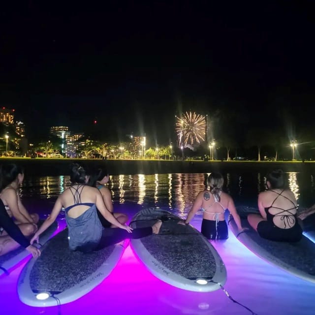 Honolulu: Fireworks Glow and Flow Yoga Class - Watching the Honolulu skyline change from dusk to night
