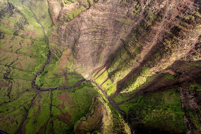 Kauai' Exclusive Helicopter Tour: Land & Explore Olokele Canyon - How the timing affects your views