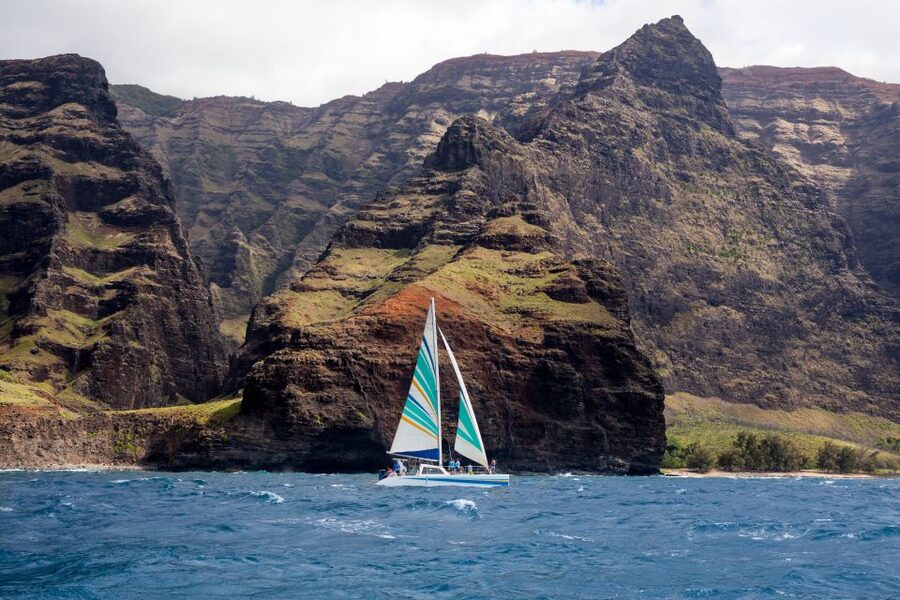 Kauai: Napali Coast Sunset Sailboat Tour with Dinner - Watching the coast from sea level