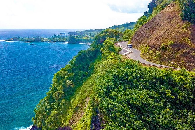 Maui: Famous Road to Hana Waterfalls and Lunch by Mercedes Van - Waiʻānapanapa’s black sand and volcanic shore