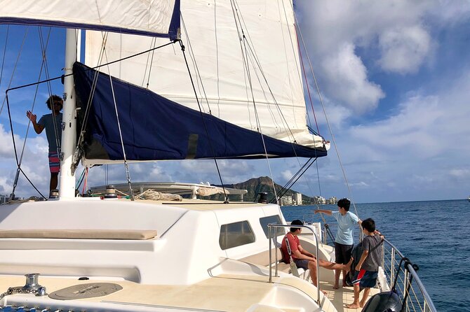 Moana’s Swim’n’Sail Cocktail Cruise Along the Waikiki Coast - Cocktails, Music, and the Onboard Mood
