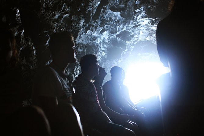 Na Pali Coast Half-Day Raft and Snorkel Adventure - Sea caves and waterfalls, conditions permitting