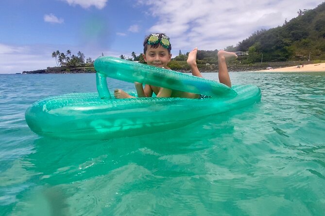 Oahu North Shore Experience: Activities, Waterfall & Free Time - Shark’s Cove, clear water, and rocky footing