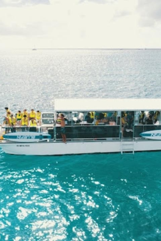 Oahu Snorkeling with Turtles, Water Scooter, Paddleboard - Musubi and cup noodles are more than a snack