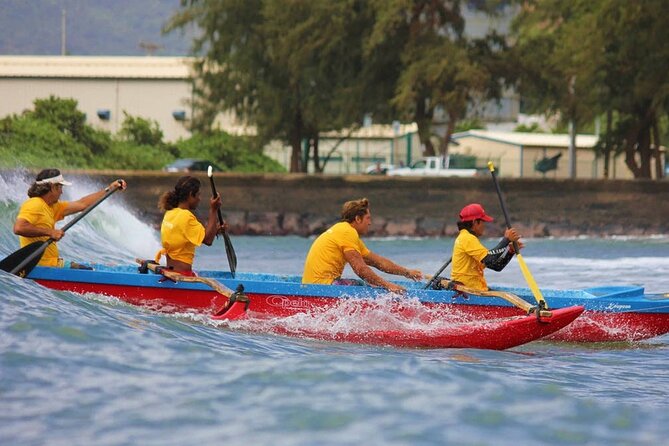 Outrigger Canoe Surfing at Kalapaki Beach - Kukii Point Lighthouse and the coastal setting