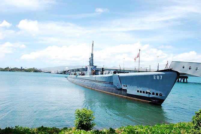 Pearl Harbor History Remembered Tour from Ko Olina - Clothing, bags, identification, and walking