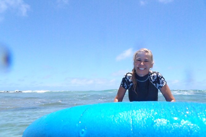 Po'ipu Surf Lesson - Learning the pop-up before you touch the water