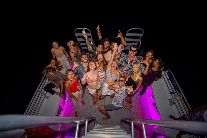 Premier Waikiki Sunset Party Cruise with Live DJ and Full Bar - Waikiki coastline after golden hour