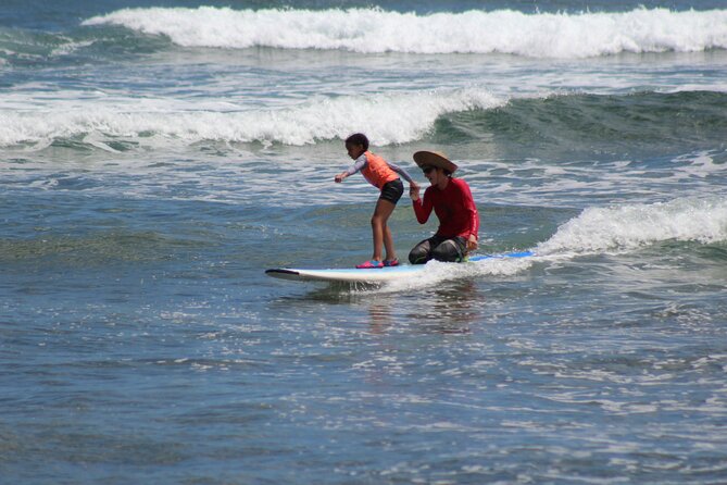 Surf Lessons on the North Shore of Oahu - About 75 minutes of catching beginner waves